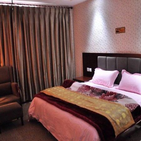 Jiuzhaigou Man Jiang Hong Hotel Bagian luar foto