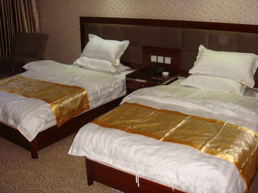 Jiuzhaigou Man Jiang Hong Hotel Ruang foto