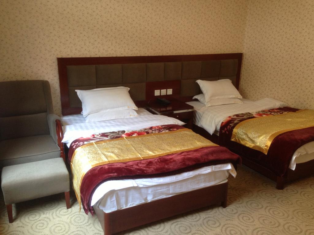 Jiuzhaigou Man Jiang Hong Hotel Ruang foto