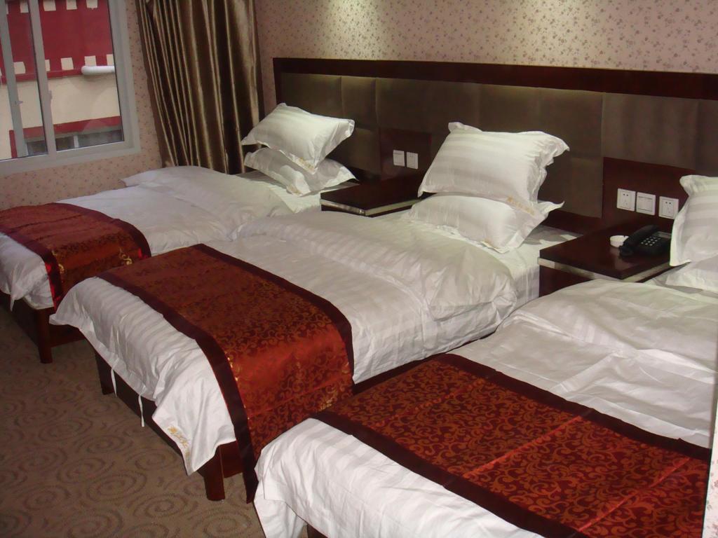 Jiuzhaigou Man Jiang Hong Hotel Ruang foto
